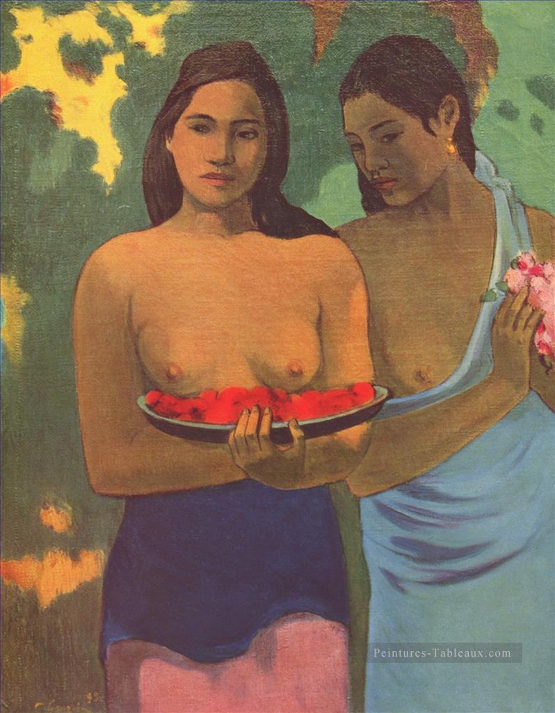 Deux femmes tahitiennes avec des fleurs de mangue Paul Gauguin Peintures à l'huile